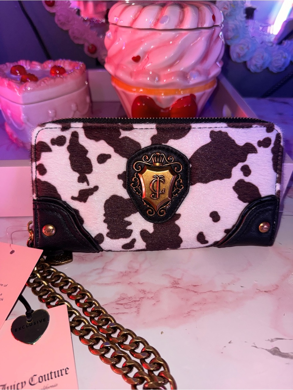 Juicy Couture Black and White Cow-Print Zip Wallet with Gold Crest